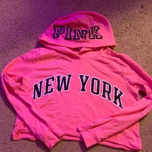 A pink cropped hoodie size M women’s